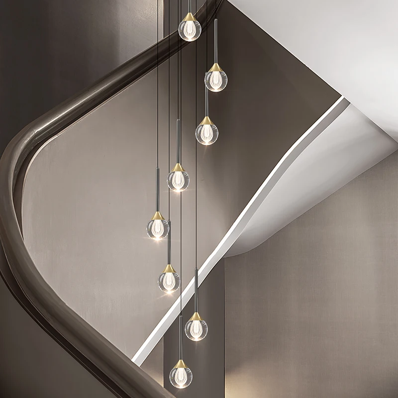 

Modern simple stair chandelier duplex building empty loft apartment spiral staircase light luxury crystal long chandelier