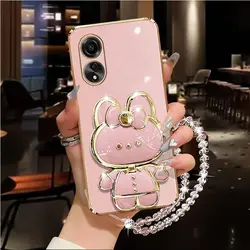 Custodia per telefono con supporto e portacompasso a forma di coniglio con cinturino di diamante elegante.