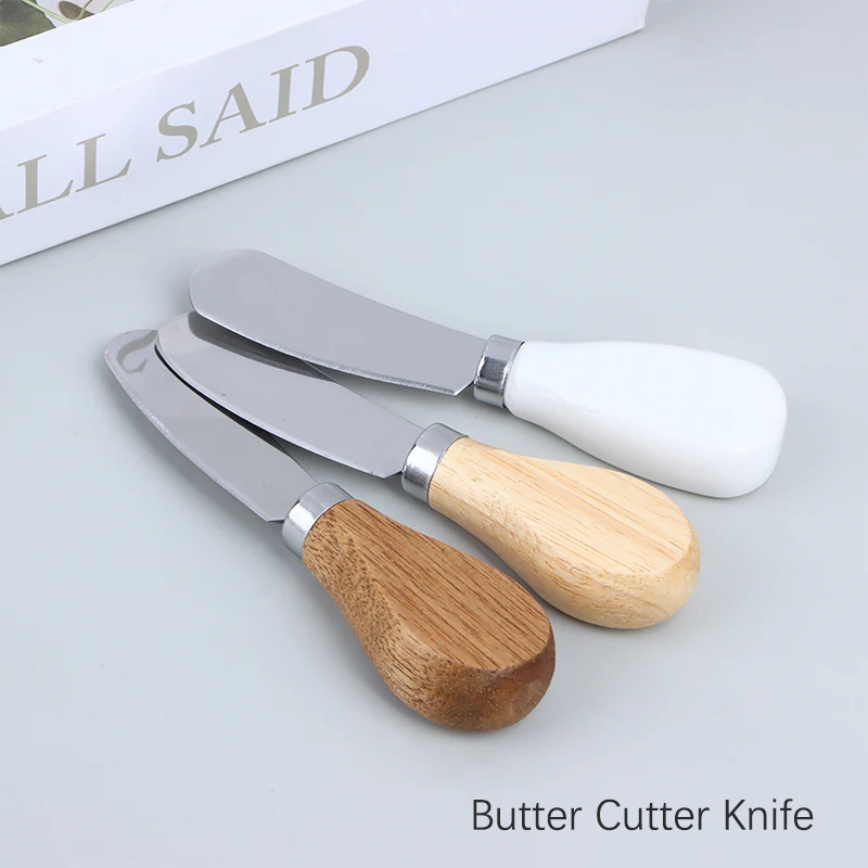 https://ae01.alicdn.com/kf/S1de1c11d09774c6aace5f87b2e122ed0C/Wooden-Handle-Butter-Cutter-Knife-Dessert-Cheese-Slicer-Knives-Toast-Breakfast-Utensil-Jam-Spreaders-Cream-Cutter.jpg
