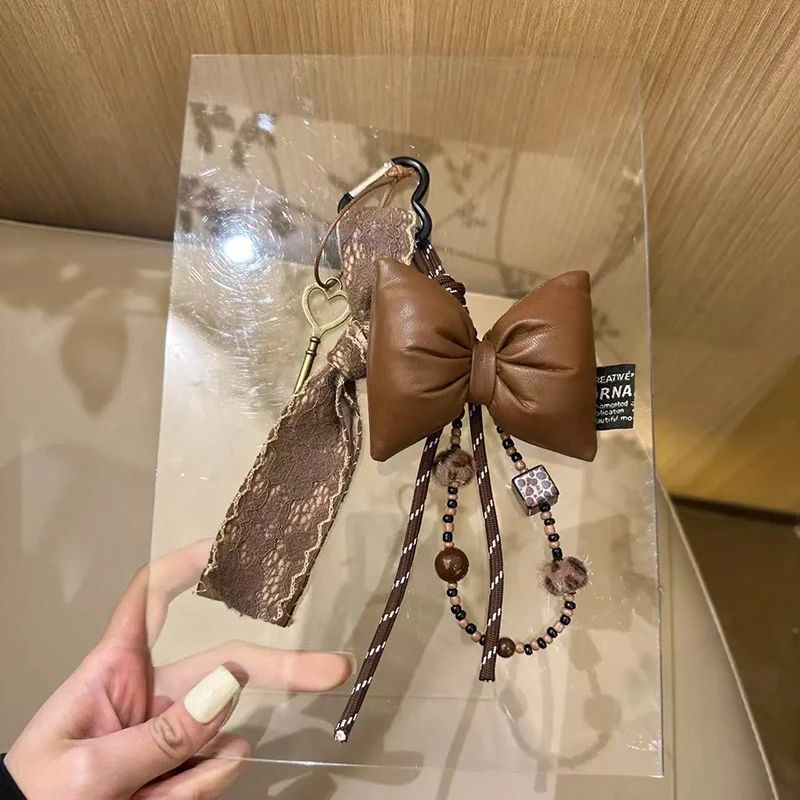 Vintage Brown Leather Bow Key Pendant Fashion Lace Ribbon Keychain Beading Braided Lanyard Key Ring Suitable for Women Bag