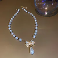 Collier avec nœud en perles et strass pour femmes, mode légère, Niche de luxe, chaîne de clavicule, nouvelle personnalité, bijoux de fête 5