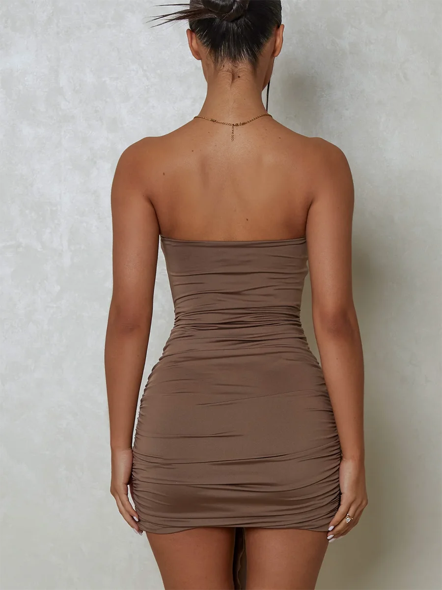 

Elegant Sleeveless Bodycon Dress with Ruched Detailing and Hollow Out Design - Perfect for Clubbing Parties and Beachwear
