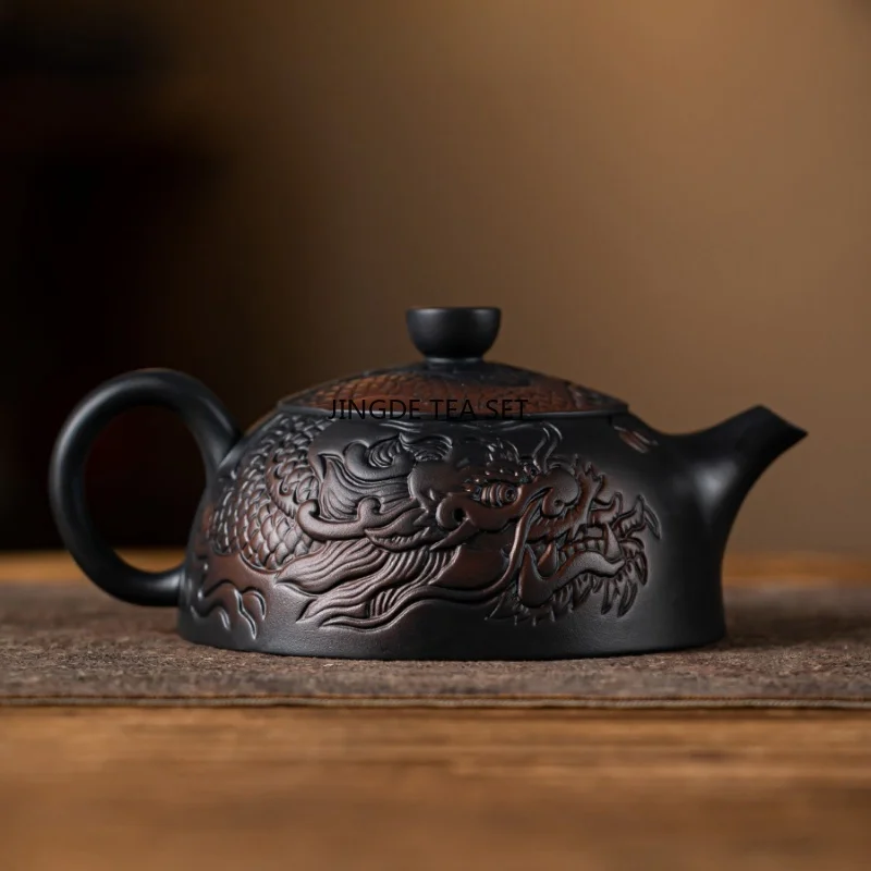Purple pottery zodiac dragon carving handmade antique relief teapot household teapot Kung Fu tea set teapot