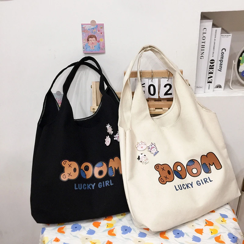 

Casual Shoulder Bag Girls Cartoon Print Large Student Book Storage Bags with Badge Ins Fashion Canvas Tote Shopping Bags Female