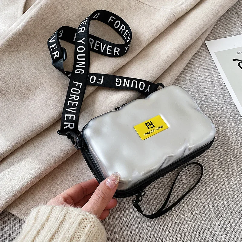 

2019 new Korean version of the hand holding mini suitcase small bag lady senior sense slung hard shell small square bag box