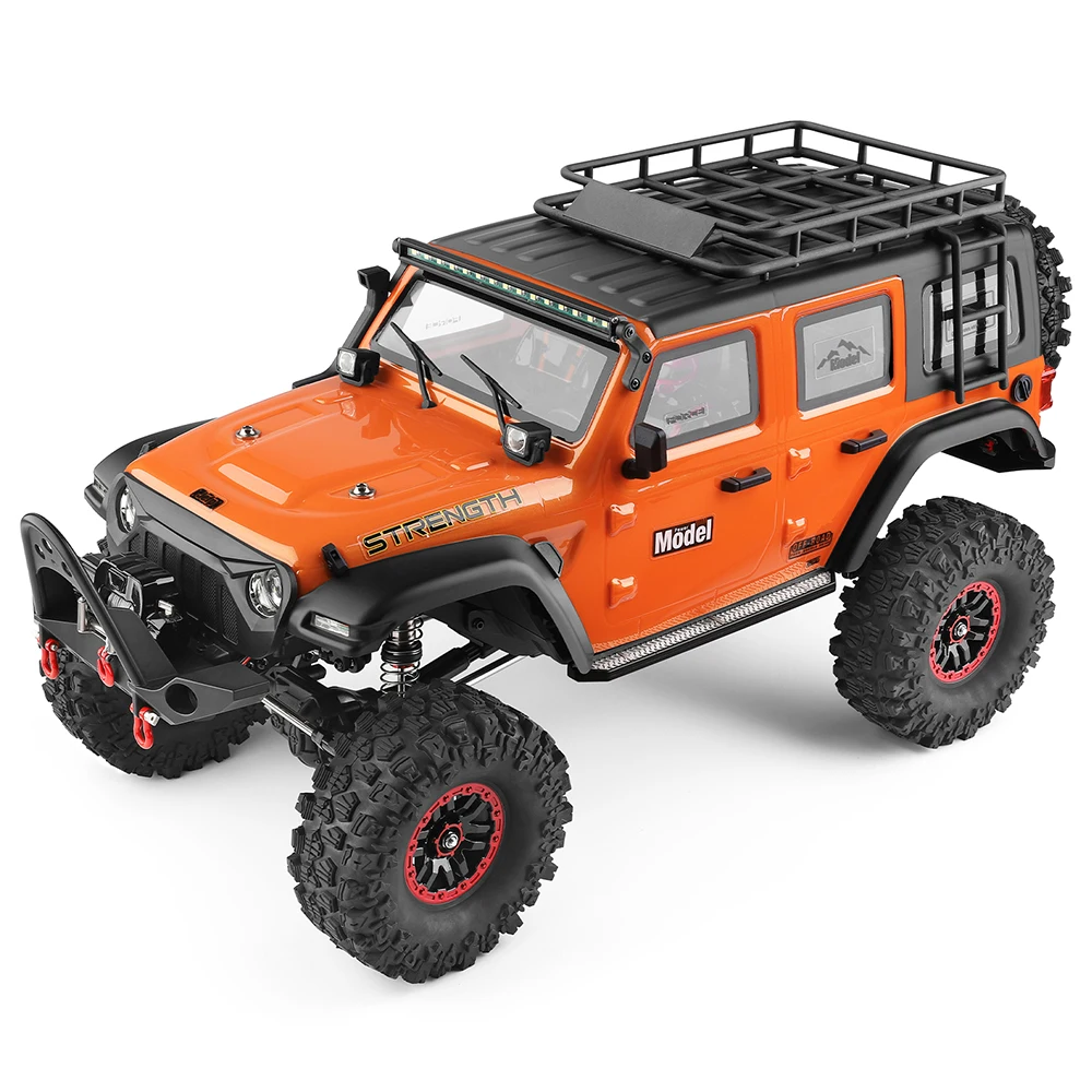 Détail des suspensions et roues de la WLtoys 104010 1:10 voiture RC escalade 4WD 2.4G 3CH orange