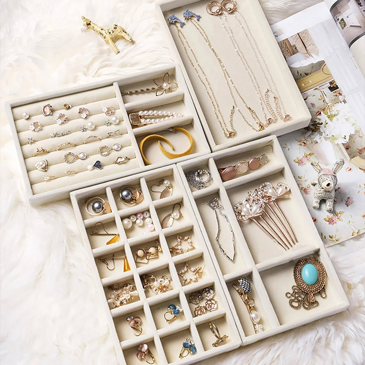 Set of four jewelry boxes storage trays for rings earrings necklaces bracelets