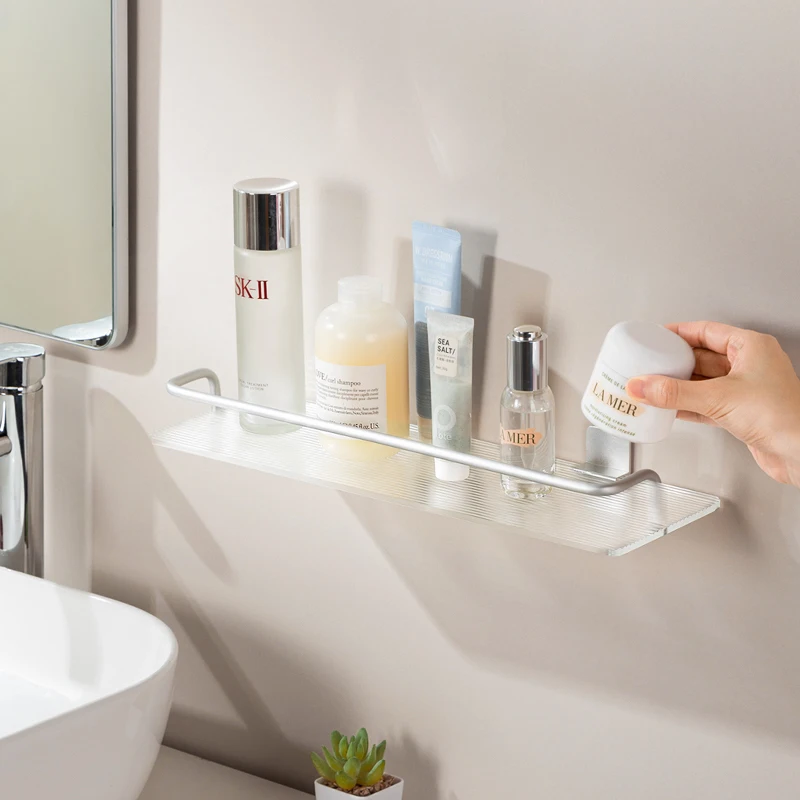 https://ae01.alicdn.com/kf/S1e357a74b7324a87be4895eadd6d8695Q/Transparent-Acrylic-Bathroom-Shelf-Wall-mounted-Partition-Free-Punching-Kitchen-Shelf-Toilet-Shampoo-Holder-Bathroom-Accessories.jpg