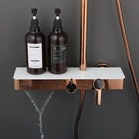 ระบบฝักบัว UIO สีโรสโกลด์ 4 ฟังก์ชั่น, ฝักบัวแบบเรนชาวเวอร์แบบติดผนังพร้อมหัวฉีดแบบมือถือ, ชุดฝักบัวพร้อมชั้นวางเก็บของ 3