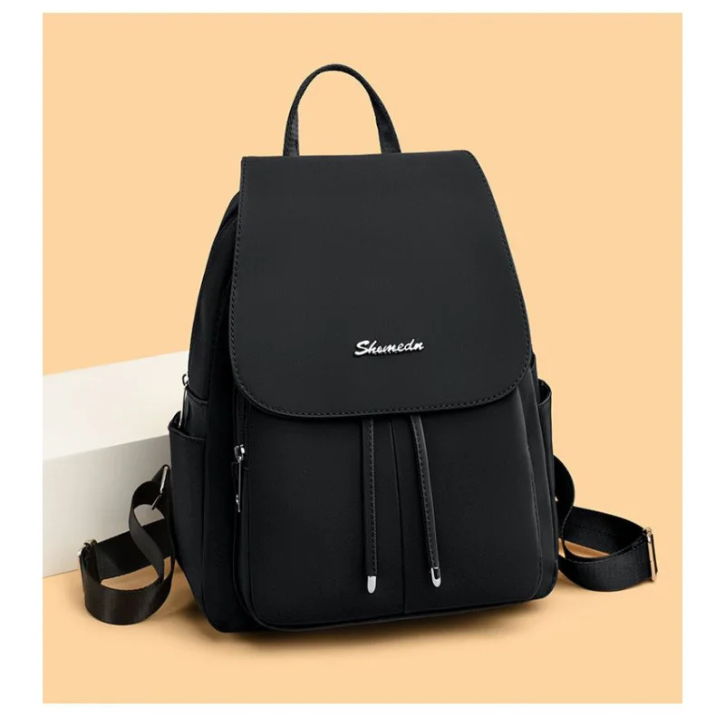 Lightweight and durable women's backpack, designed for both shoulder and travel use, made of Oxford fabric to accompany you on y