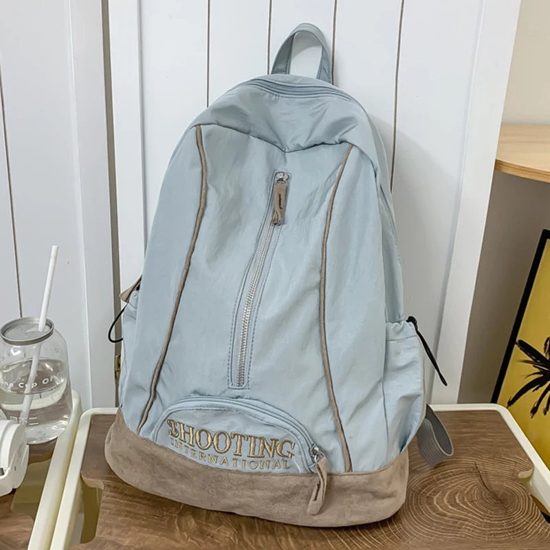 

Lightweight 2023 New Woman Backpack Man Woman School bag For Teenage Girls Boys Travel Rucksack