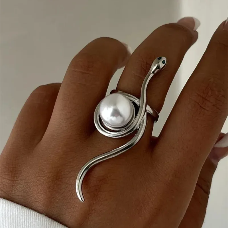 On which hand and finger should a girl wear a white pearl? - Quora