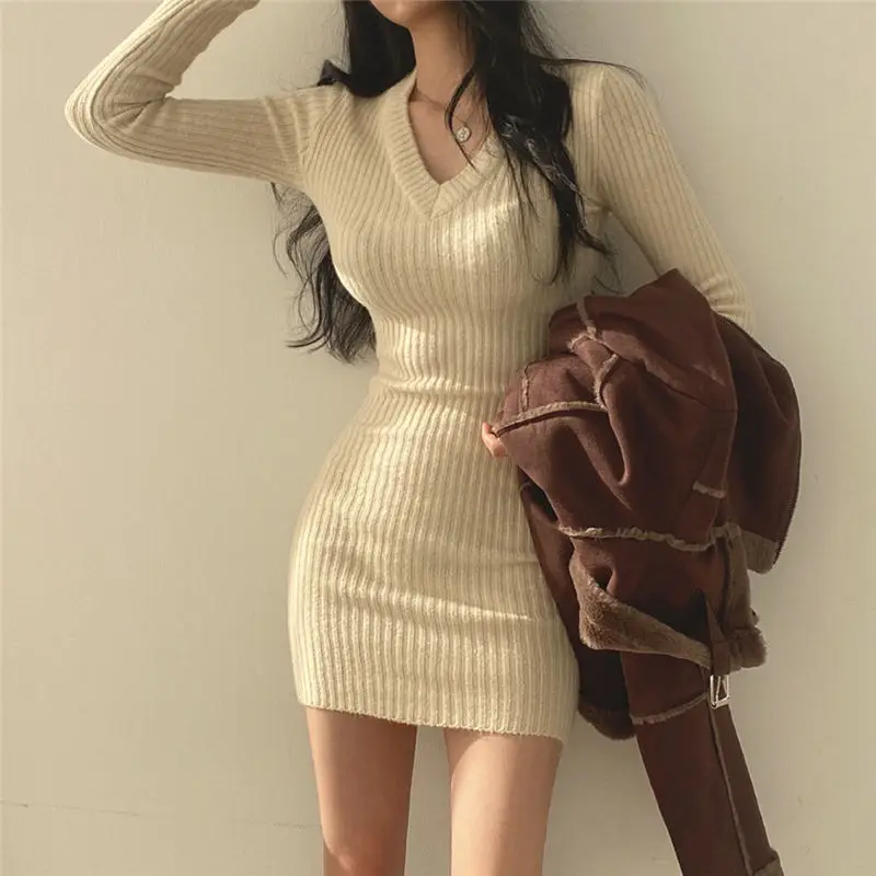 

Sexy V-neck Long-sleeved Knitted Dress Female Spring and Fall Hundred Small Slim Tight Sweater Bottoming Package Hip Skirt