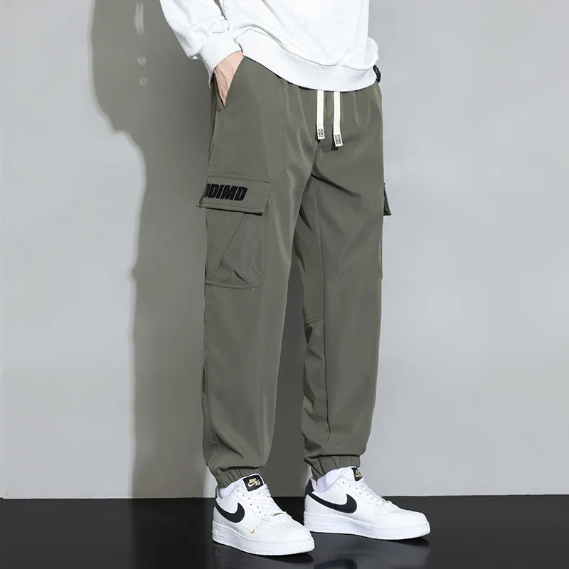 Spring Autumn New Solid Color Fashion Elastic Waist Cargo Trousers Man High Street Casual Pockets Drawstring Ankle Length Pants