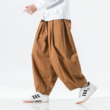 Pantaloni a gamba larga da uomo 2025 Primavera Autunno Pantaloni maschili Allentati Casual Baggy Pantaloni sportivi da jogging Pantaloni cargo vintage maschili oversize 5XL 1