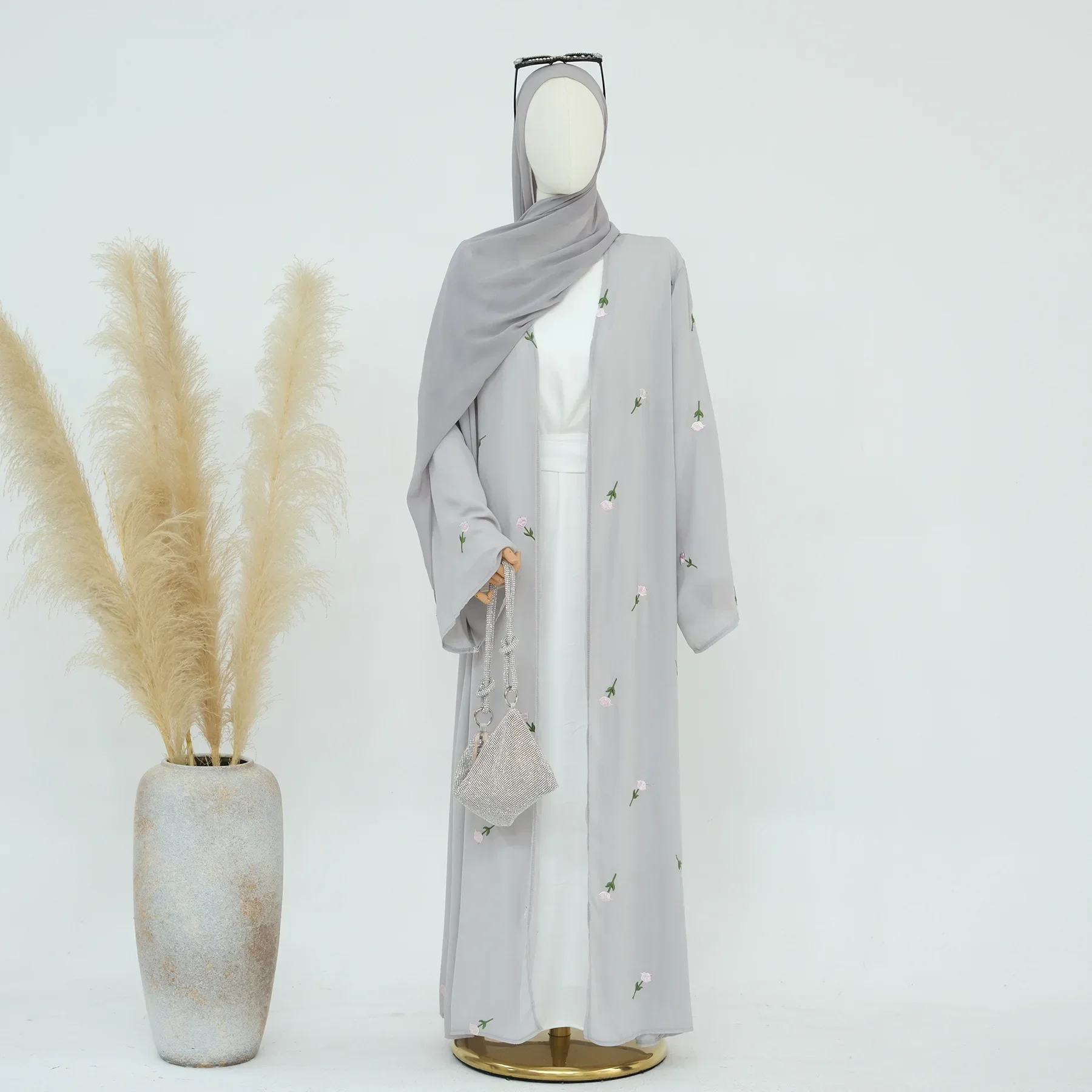 gray abaya and hijab