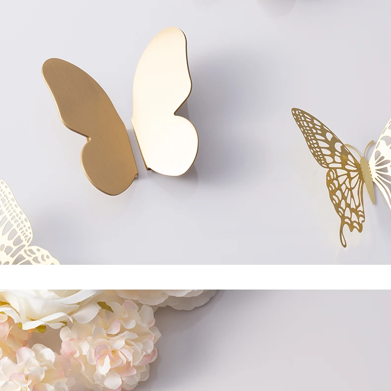 modern brass drawer knob butterfly shape close up