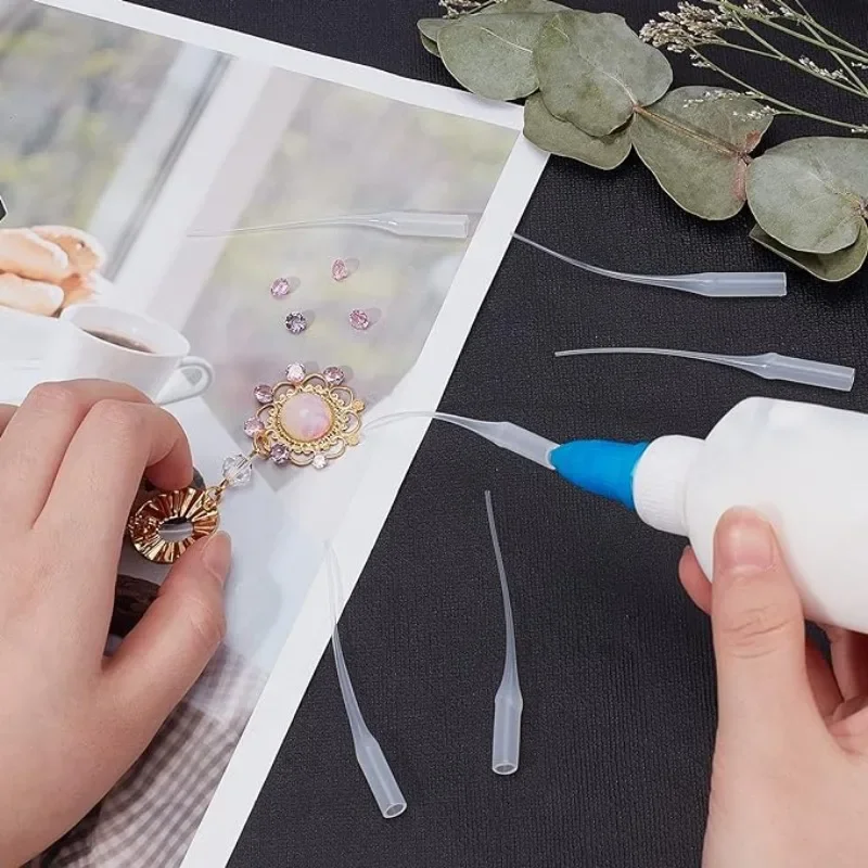 Lot de 100 compte-gouttes distributeurs, outils essentiels pour le modélisme et l'artisanat.
