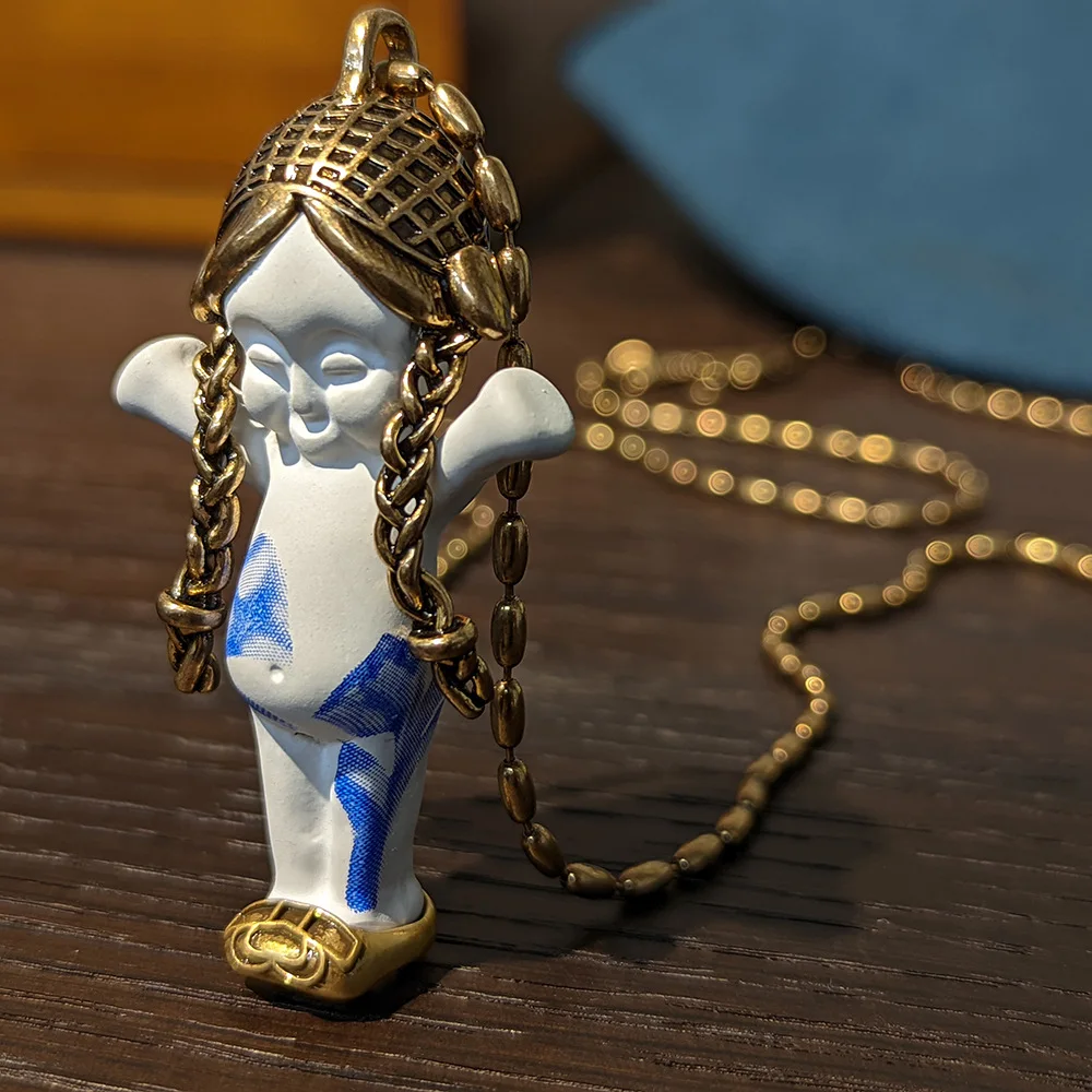European and American fashion white doll pendant necklace