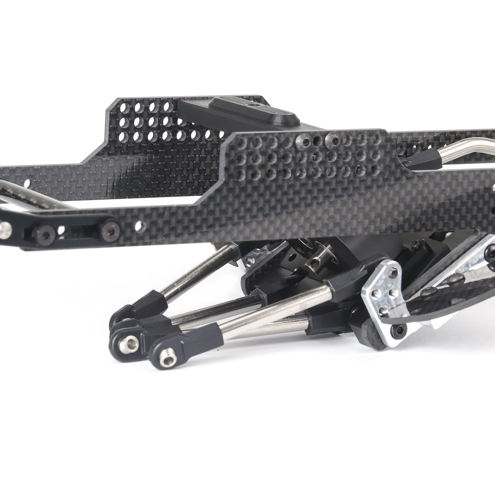 Châssis crawler buggy RC avec moteur et roues montées, détail des fixations.