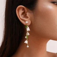 2025 New Sweet Temperament Small Fresh Bamboo White Lily Of The Valley Flower Earrings Elegant And Gentle Asymmetric  Earrings 4