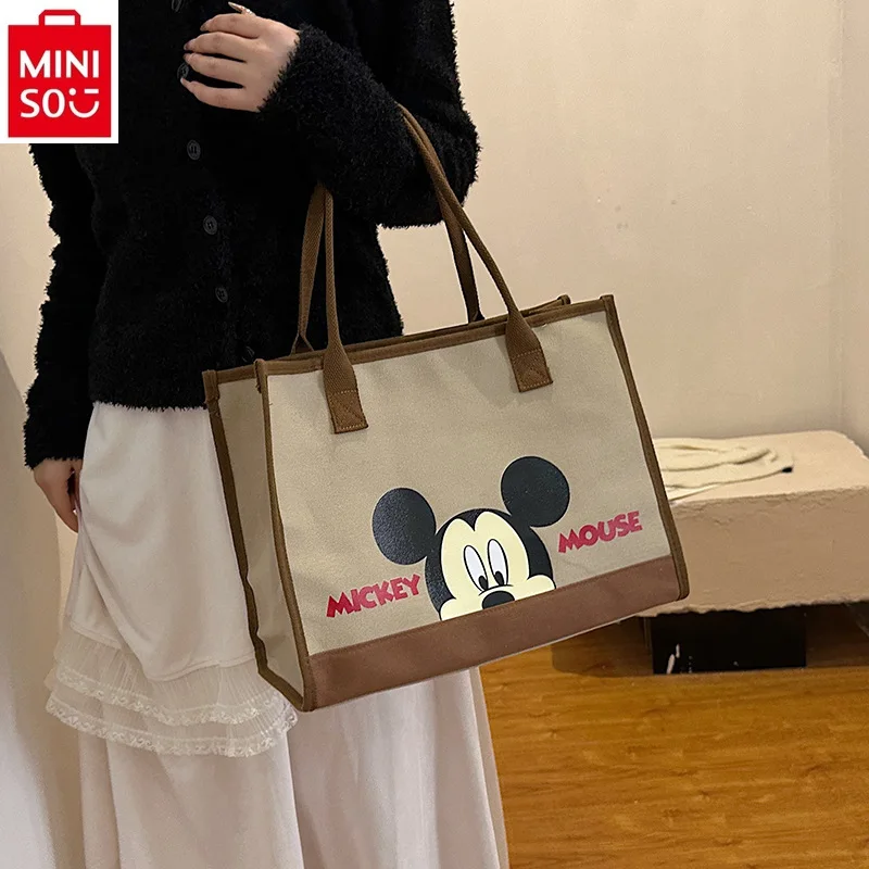 

MINISO Disney Large Capacity Canvas Bag Women's Cartoon Mickey Handheld Shopping Bag Student Commuter Tote Bag