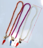 Collier de perles colorées élégant et accrocheur, accessoire de mode estival, style bohème, avec pendentif poisson tricoté à la main 4