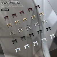 10PCS Black white Glossy Simple Cute Ribbon Mini Bow Tie Gold Silver Alloy Nail Art Rhinestones Decorations Manicure Ornaments 1