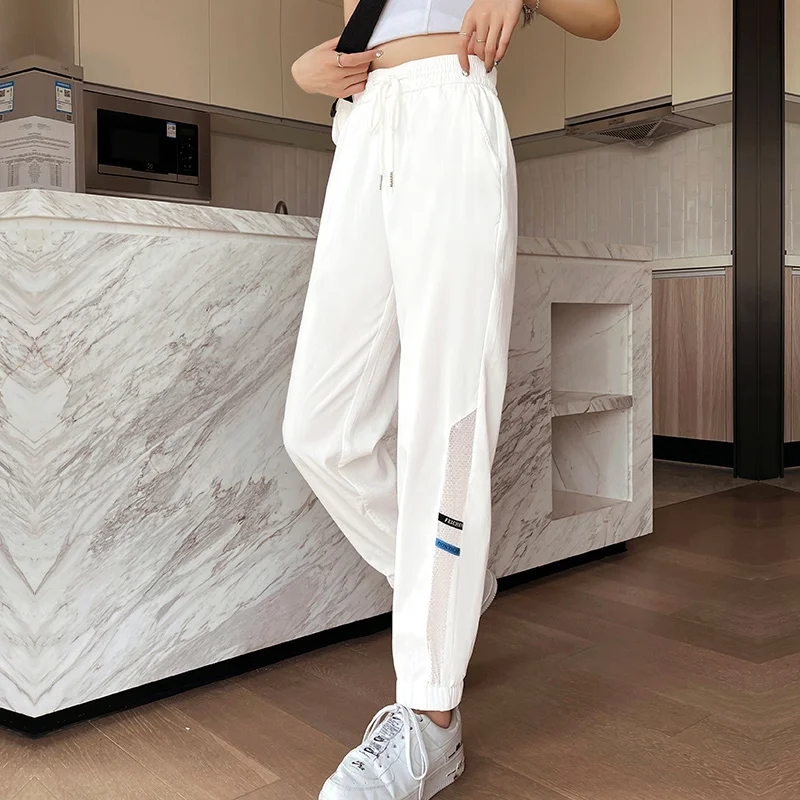 Spring Summer Women's Solid High Waisted Pockets Gauze Shirring Drawstring Elastic Harlan Casual Sports Loose Clothing Pants spring new dopamine tie foot guard pants for women s design loose and slim casual versatile harlan sports