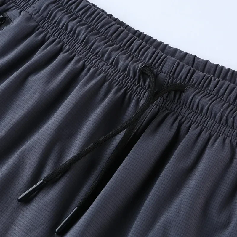 Pantaloncini da uomo al limone pantaloncini da allenamento leggeri da corsa estivi pantaloncini sportivi ad asciugatura rapida tasche con cerniera pantaloncini da allenamento in palestra