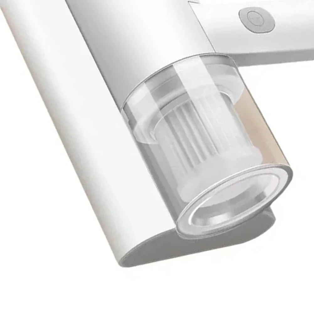 vacuum cleaner being used on a sofa cushion