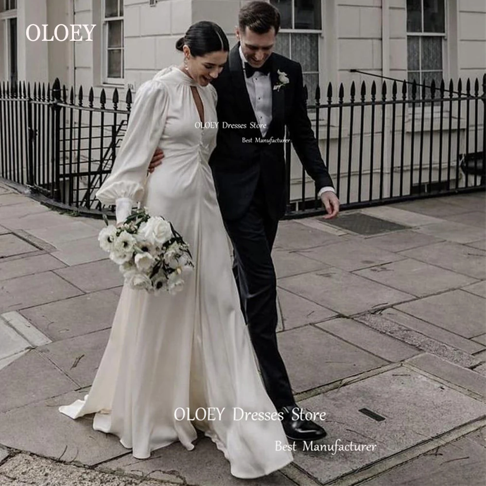 

Женское ТРАПЕЦИЕВИДНОЕ свадебное платье с открытой спиной, высоким воротом и длинными рукавами-фонариками