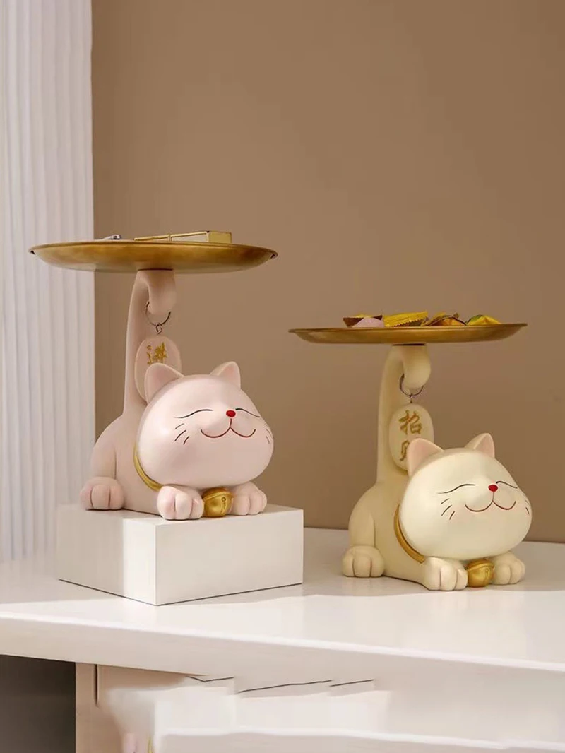 The Chic Cat Metal Key Tray by KittyNook Cat Co. is a stylish cat key caddy or entryway organizer for your white table.