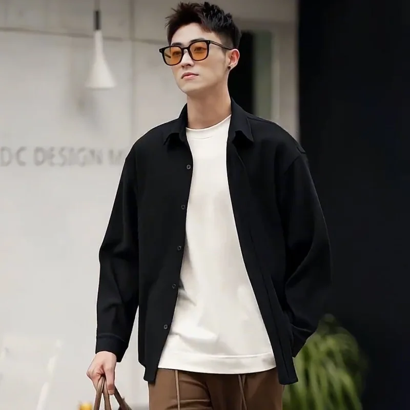 

Spring and Autumn New men's lapel pit stripe loose ruffled handsome long sleeved shirt light mature men's drape feeling shirt th