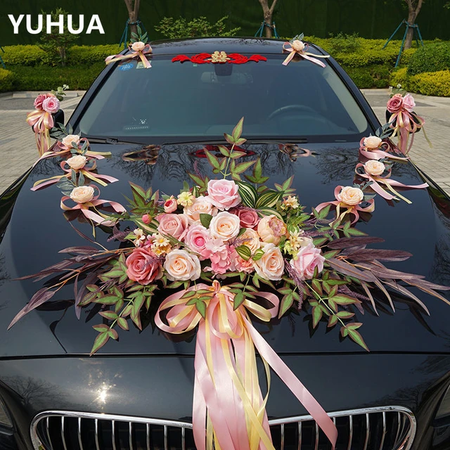 White wedding car decorated with roses flowers and pink bow. wall mural •  murals honeymoon, expensive, elegance