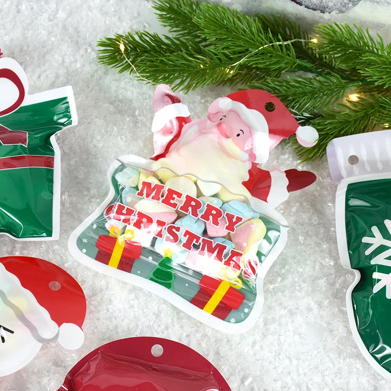 

10pcs Christmas Plastic Candy Bag Cartoon Santa Claus Snowman Biscuits Snacks Sealing Bag New Year Party Gift Packaging Supplies