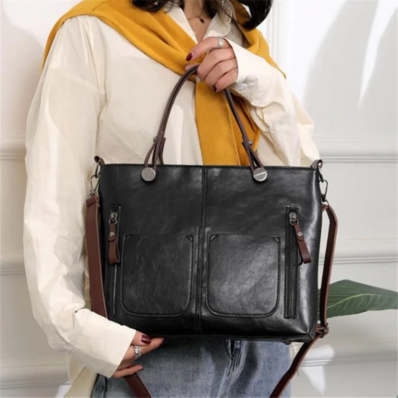 Retro leather handbag with two zipper pockets, versatile tote and crossbody style, classic women’s work and business bag. black
