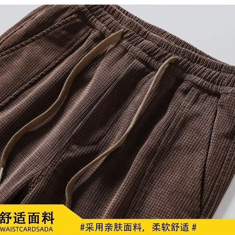 spring autumn new Solid color fashion Elastic waist sweatpants man High street Casual lacing Pockets corduroy All-match trousers
