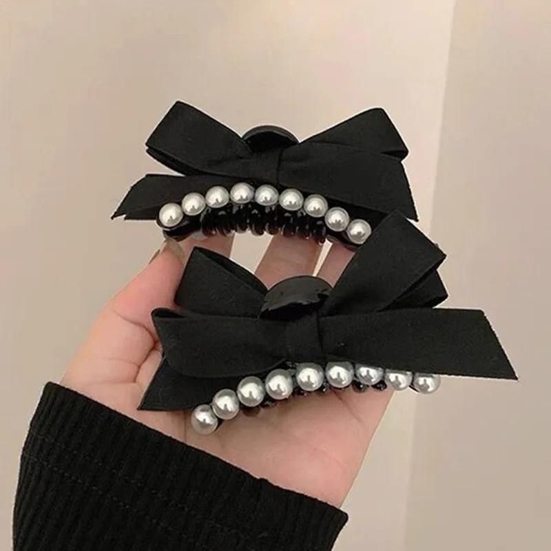 

AISHG Korean Pearl Black Bow Hairpin for Women Temperament Design Sense Shark Clip Fashion Versatile Hair Accessories