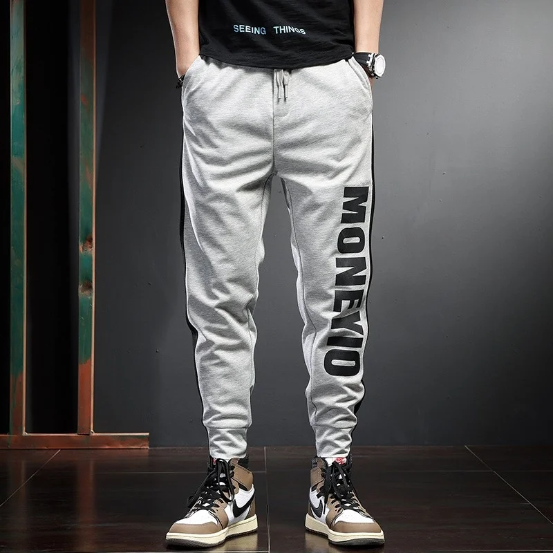 

Мужские спортивные штаны, спортивные тренировочные штаны, модные серые спортивные штаны с полосками по бокам, буквенным принтом, с эластичным поясом, на завязках, джоггеры