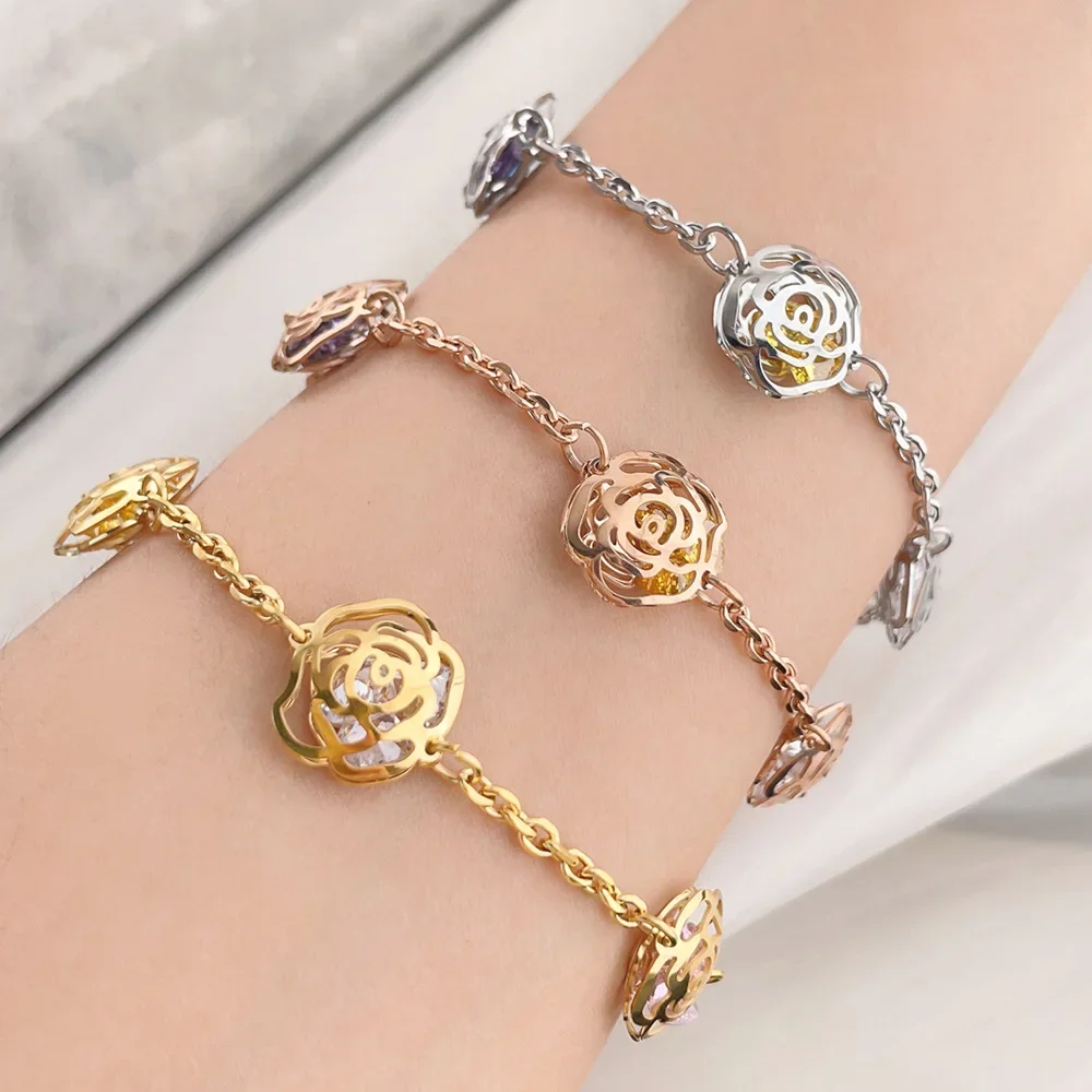 

Женский браслет из нержавеющей стали с камелией