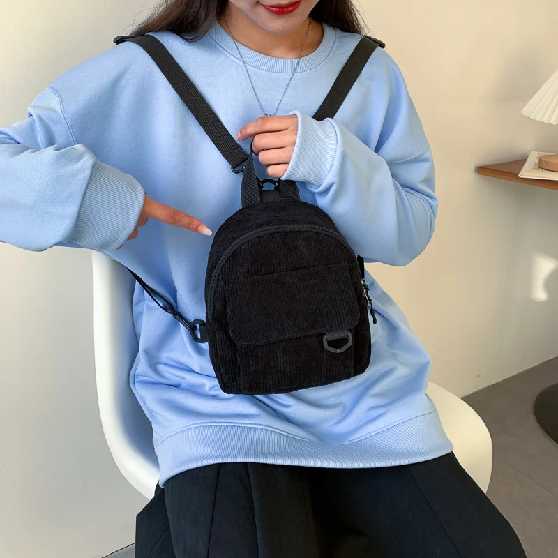 Mini sac à dos en velours rayé minimaliste et polyvalent pour étudiants et femmes pour les voyages de loisirs