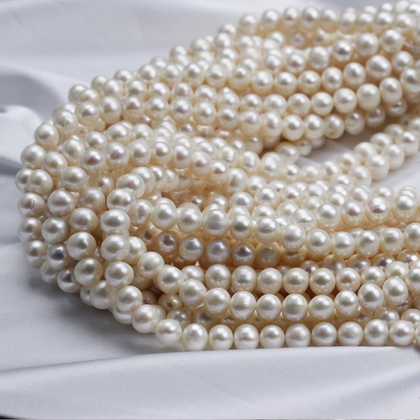 

Wholesale latest design 8-9mm AA near round potato natural freshwater white pearl strand