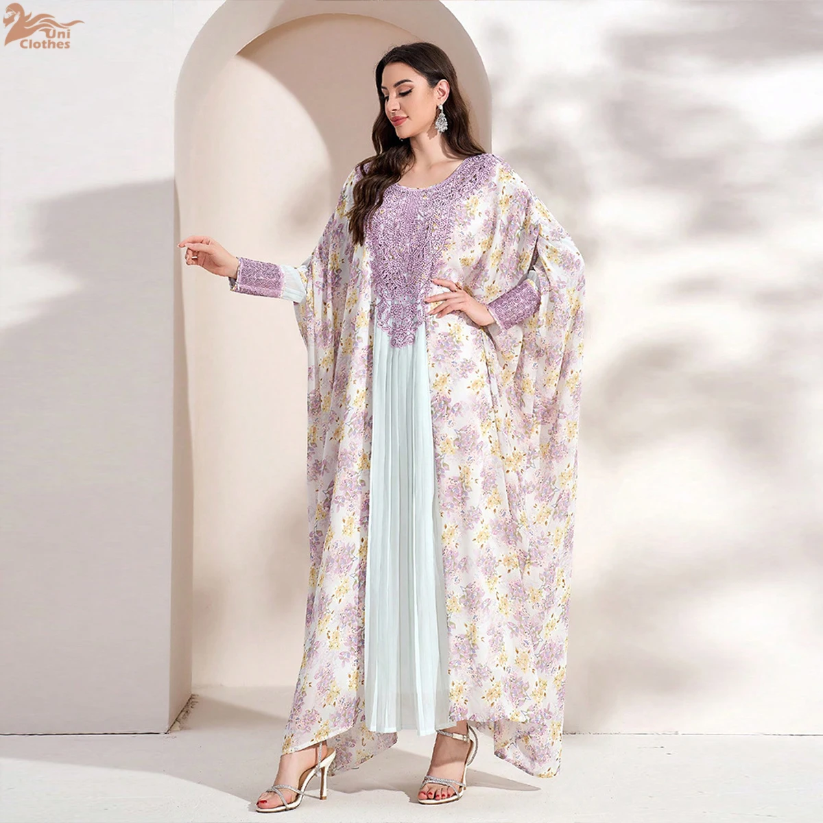 Uni Dubai فساتين أنيقة بأكمام تشبه جناح الخفّاش وم...