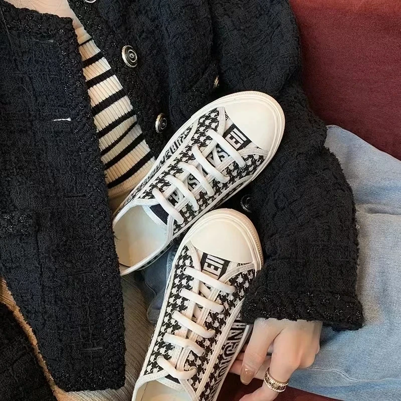 2024 new female designer brand letters casual sports thick bottom small white shoes female canvas board shoes.