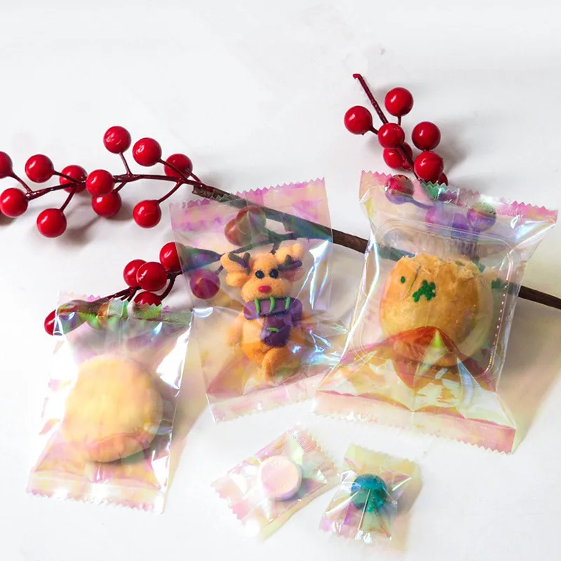 100Pcs 레인보우 투명 레이저 플랫 포켓 캔디 비스킷 베이킹 기계 봉인 된 가방 파티 선물 포장
