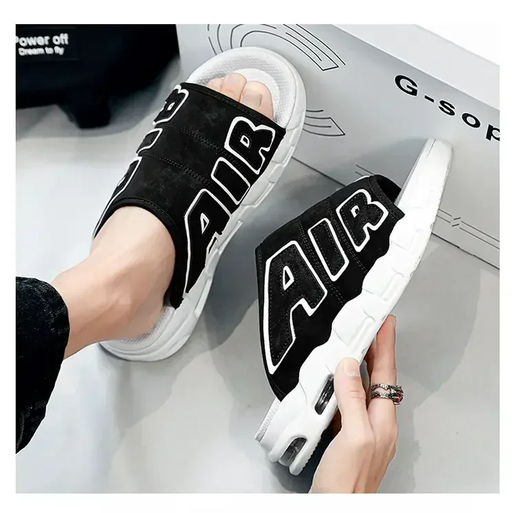 Textured grip pattern on the bottom of platform slippers.