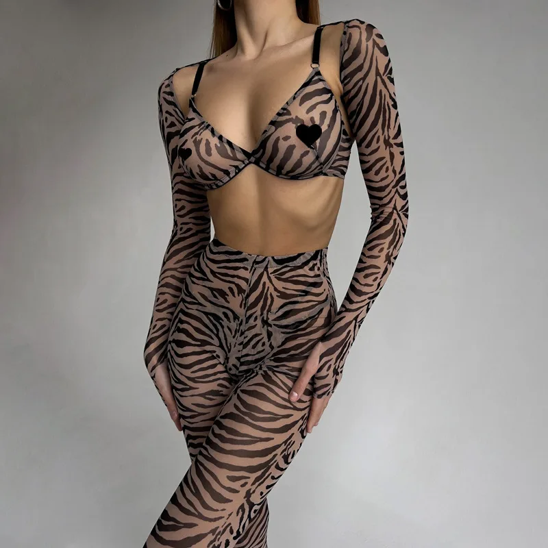 

Комплект женского нижнего белья из четырех предметов с леопардовым принтом