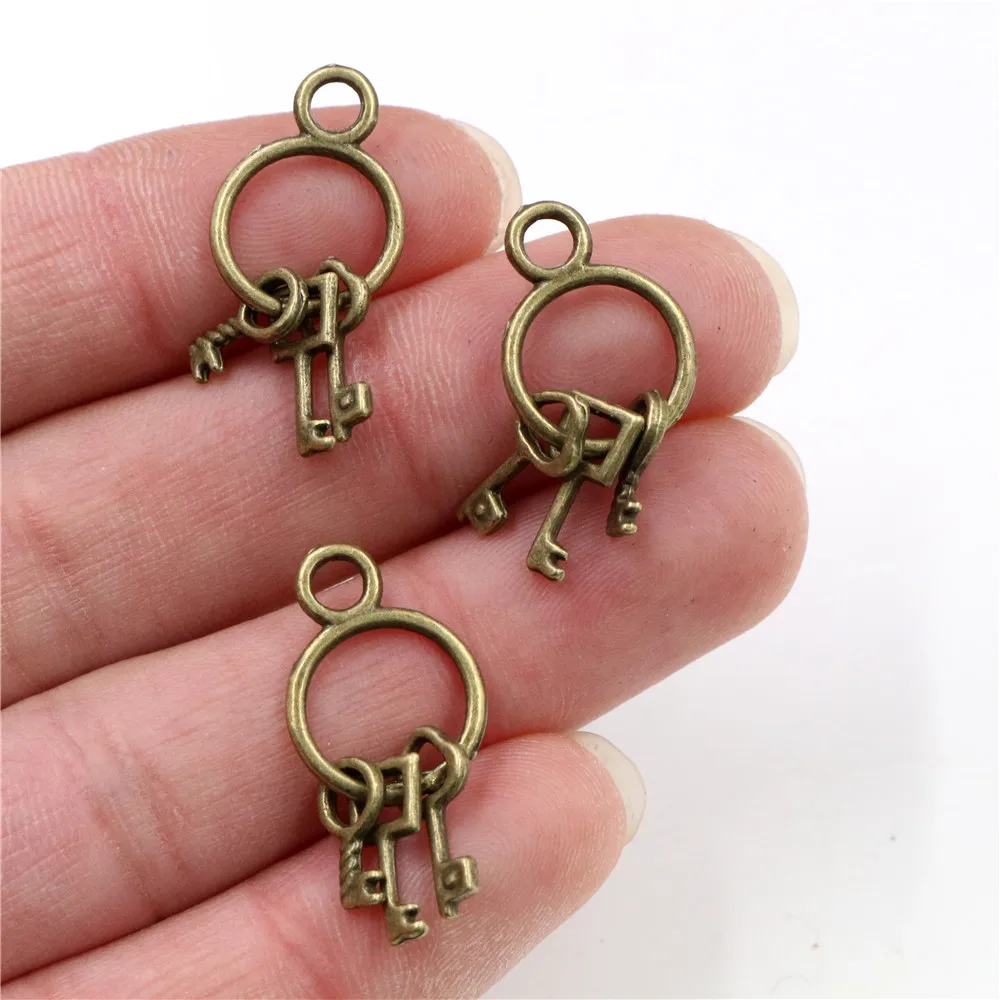 Ciondoli Portachiavi In Bronzo Antico (4 Pezzi): Fai Da Te E Gioielli Vintage - 4