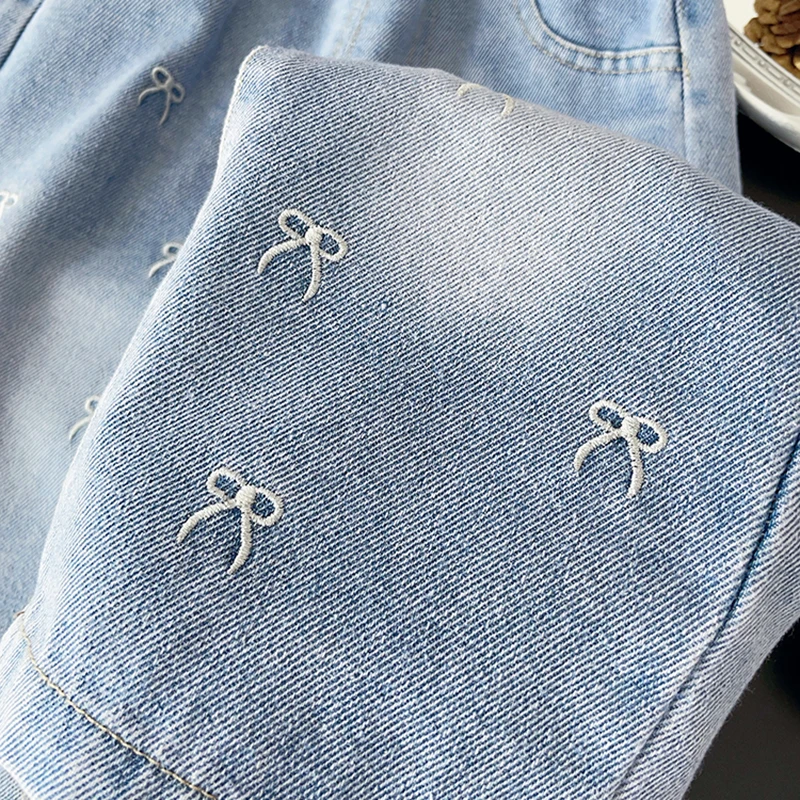 جديد الفتيات Bowknot المطرزة الجينز الربيع والخريف الحلو عادية واسعة أرجل تنوعا موضة بناطيل أطفال